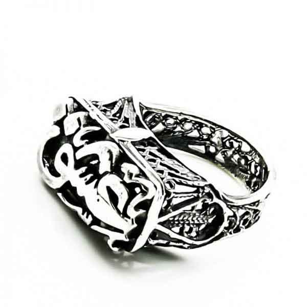 Egyptian sterling silver ring spelling ‘Passion’ on it.