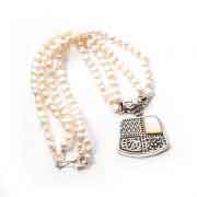 Pearls and silver collar Pearls and silver collar