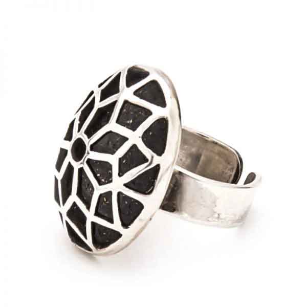 A geometric oval shaped silver ring